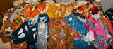 At least a dozen vintage Hawaiian shirts, most are Men's M.