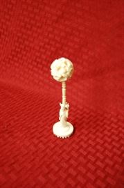 Carved bone Asian statue