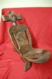 African carved birthing chair