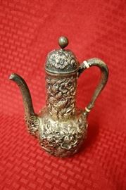 Sterling repousse tea pitcher
