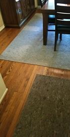 Selection of industrial rugs of various sizes...great for mid century or industrial decor!