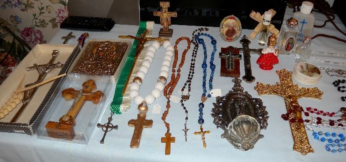 Many lovely religious items - beautiful crosses made of different materials; several rosary; holy water; figurines; pictures; coins; Infant of Prague figurine with clothing; mantillas