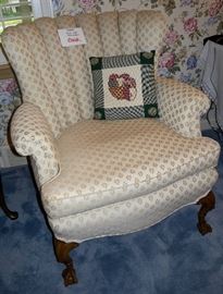 Lovely upholstered claw-foot channel back chair