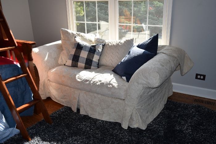 Covered Loveseat & Pillows