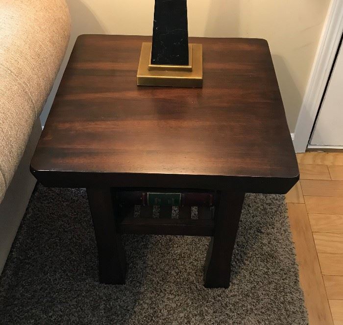 This chairside table is a contemporary piece that lends towards versatility. Perfect for small areas, this table is a chic space saver.
Constructed of hardwood solids and mindi/birch veneers.