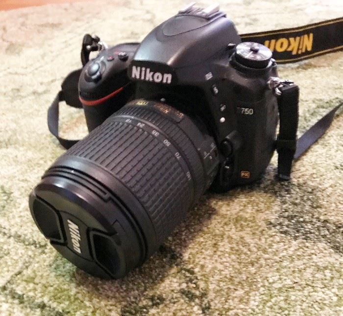 Nikon D750 DSLR Camera Body with Lens and LowePro Camera Case.  Nikon Lens:  Nikon 18-140mm f/3.5-5.6G ED AF-S DX (VR) Lens