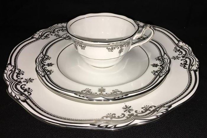 Spode Bone China Dinnerware | Stafford Platinum Pattern | 34 Pieces Total | Marked: Spode. Fine Bone China. Made In England. Y8636. Stafford Platinum | 12 Dinner Plates, 12 Plates measuring 7.75″, 11 Cups.

Josiah Spode apprenticed as a potter in the mid-1700s, and by 1754 he went to work for William Banks in Stoke-on-Trent, Staffordshire, England. He went on to start his own pottery business making cream-colored earthenware and whiteware with blue prints. In 1770, he took over as the master of Banks’ factory, and ended up purchasing the business in 1776, according to Warman’s Antiques & Collectibles (Krause Publications) edited by Noah Fleisher.

“Spode pioneered the use of steam-powered, pottery-making machinery and mastered the art of transfer printing from copper plates,” as noted in Warman’s. “Spode opened a London shop in 1778 and sent William Copeland there in about 1784. A number of larger London locations followed. At the turn of the 18th century, Spode introduced bone china. 