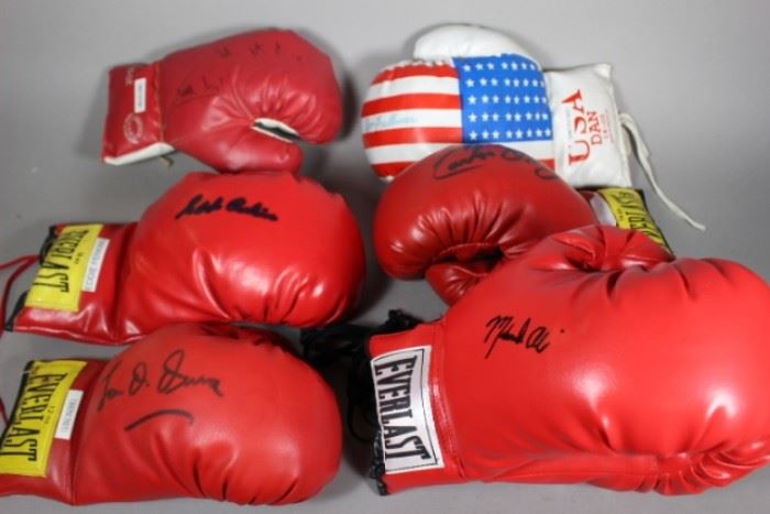 Large collection of signed boxing gloves