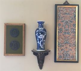 Framed Japanese Tsuba (sword guards); Cherry Blossom Vase on Polychromed Lacquer Wall Bracket; Framed Embroidered Kimono Cuffs