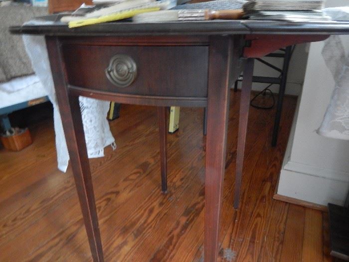 Vintage side table in cherry wood.