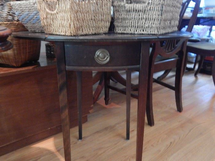 Vintage accent table with side leaves. They fold down.