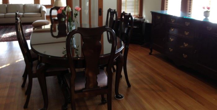 Vintage, solid mahogany Queen Anne table, 8 chairs with silk moire, china chest and side table. Custom cut tops on table and chest