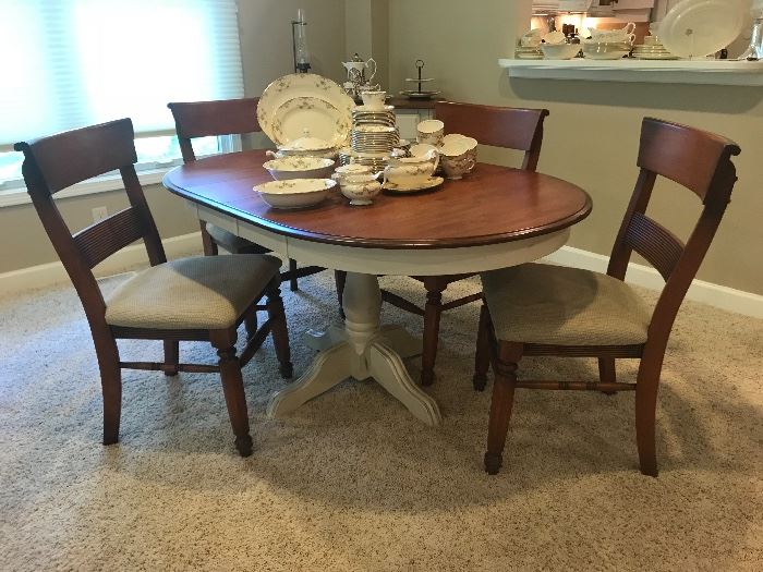 Round solid wood Canadel (made in Canada) Dining set table,  4 chairs, table shown with 2 leaves.