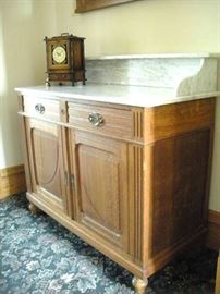 Marble Top Wash Stand and 1 of many old Mantle Clocks.