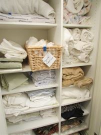 Linens and towels one of two closets full