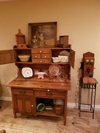 Overview of vintage Hoosier filled with great Syracuse and Wedgwood China, pottery from McCoy, Weller