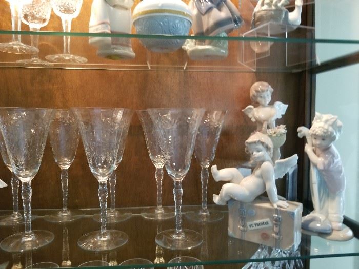 Lladro figurines and antique crystal wine glasses