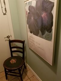 Antique needlepoint chair with Georgia O'Keefe poster