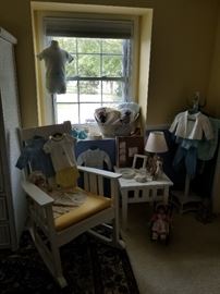 Crate and Barrel Rocking Chair and Table with vintage baby clothes
