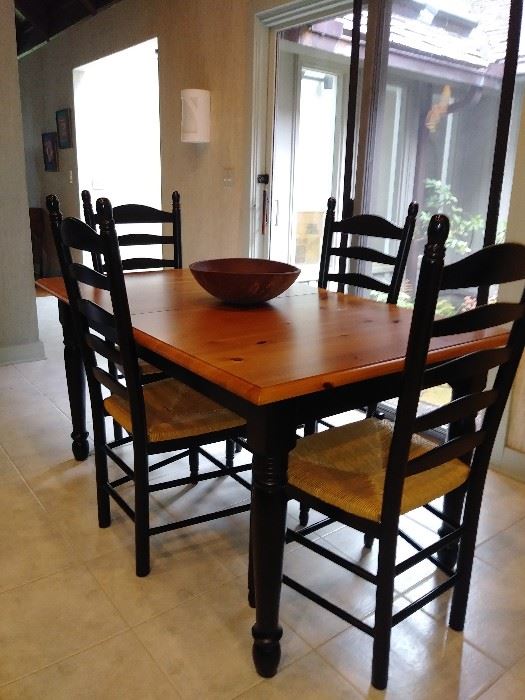 Nice farm table with ladder back chairs (table has a leaf)