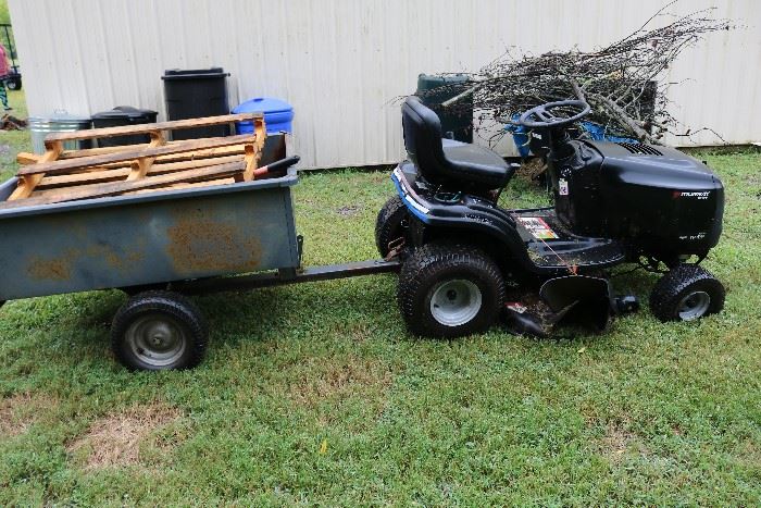 Murray riding mower. Works great. Has one tire that could be replaced.