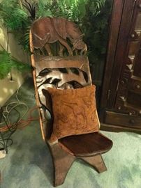 African carved birthing chair