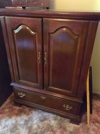Mahogany finish cabinet