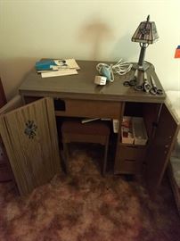 Brothers sewing machine in desk/cabinet with stool