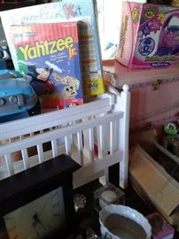 Doll crib, changing table and game assortment 
