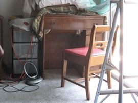 Nechii Sewing Machine, electrical foot pedal (not shown) w a chair.  Woven cover is also included as shown