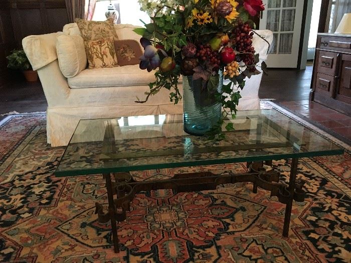 Antique coffee table with glass top. 