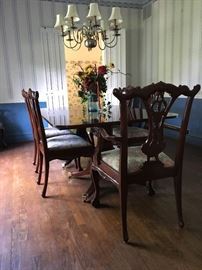 Kindel formal dining room table. Extends to comfortable sit 10-12. Self storing leaves. Double pedestal. 