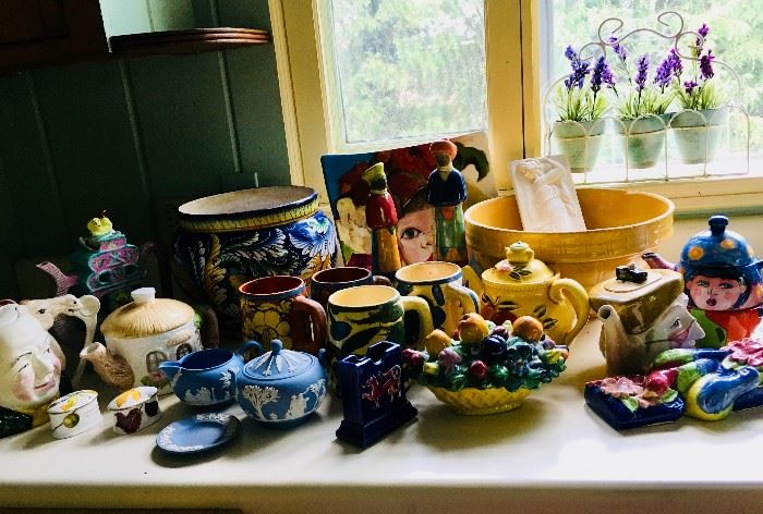 Assorted vintage pottery pieces.