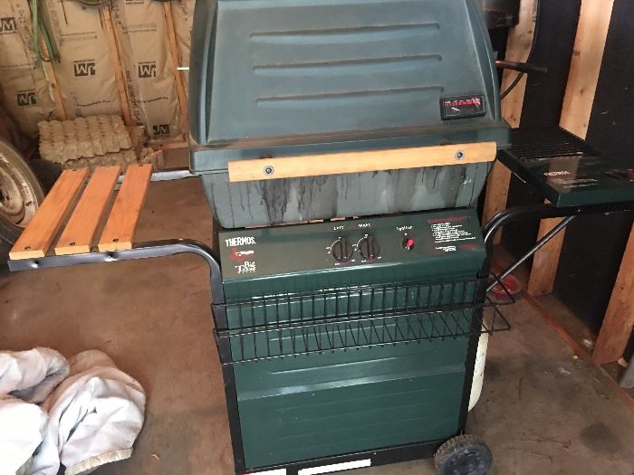 Thermos gas grill with side burner. Gently used. $175