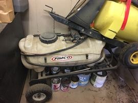 Sprayer designed to be pulled by a mower or tractor.