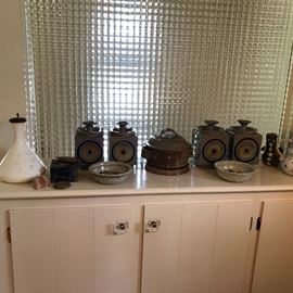 Mid century set of Tyrone Larson canisters as well as some of his other pieces.