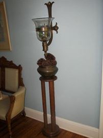 sconce, plant stand, and brass bowl