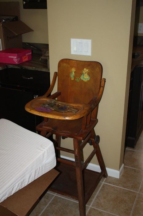 Antique child's chair which turns into a low style stroller, very cool & in great shape. 
