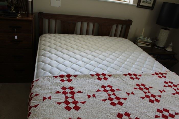 Furniture Queen bed and red white quilt