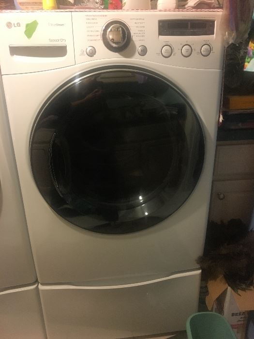 LG Washer and Dryer on pedestals