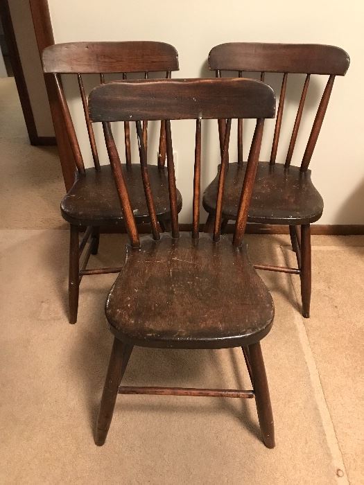 Set of four primitive chairs ! One is not pictured! 