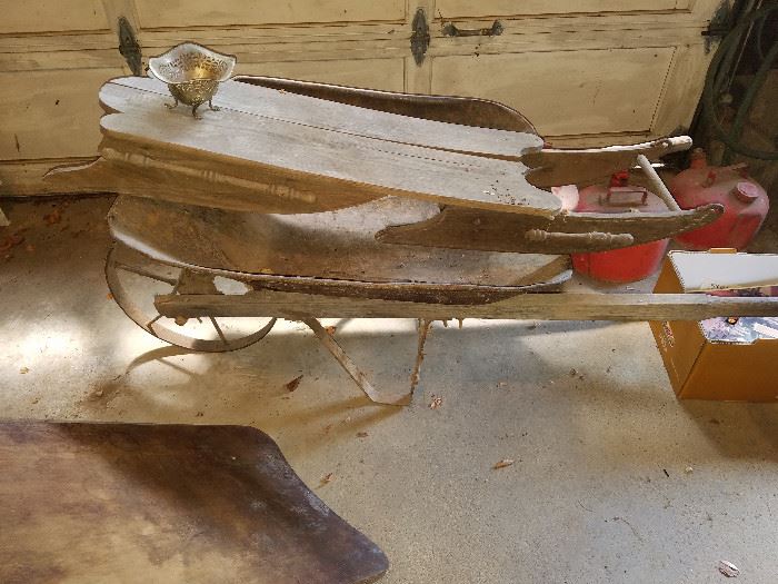 Unique folding sled and iron wheel barrow