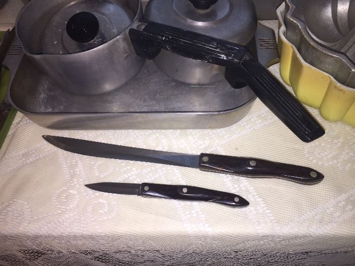 two brand new Cutco Knives