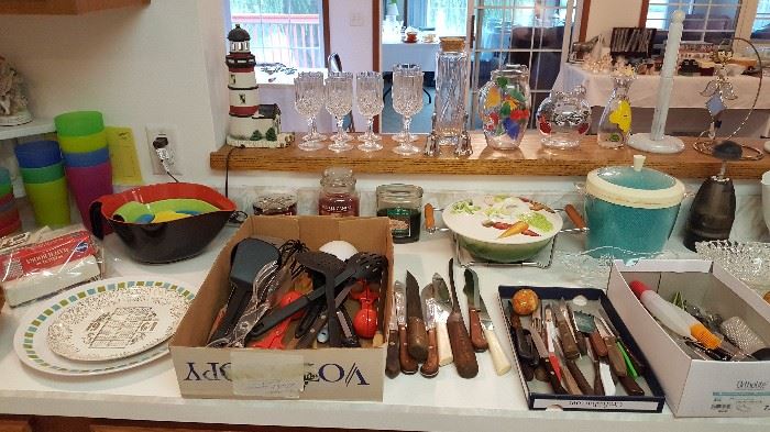 Kitchen utensils, burlap ice bucket, candles, stemware