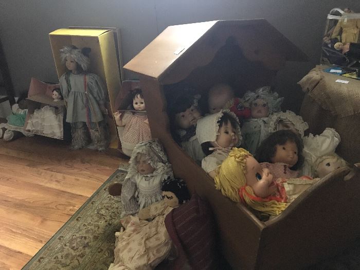 Handmade wooden cradle and doll collection