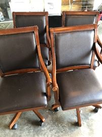 4 matching rolling office chairs