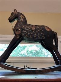 Large rocking horse with brass accents