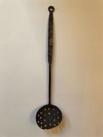 Very cool long-handled iron spoon. Note worn edge from years of right-handed stirring! 