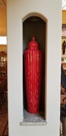 These extra large lidded red fluted jars are worth between $550 - $750 each.  Over 4 feet tall!
http://www.shopcandelabra.com/global-views-fluted-temple-jar-red.. 
We have them for sale at this estate sale for $250 each! 
2"Dia. x 48.5"H
