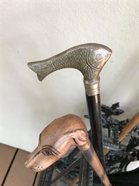 Fish walking stick ($60). Dog head walking stick ($48)